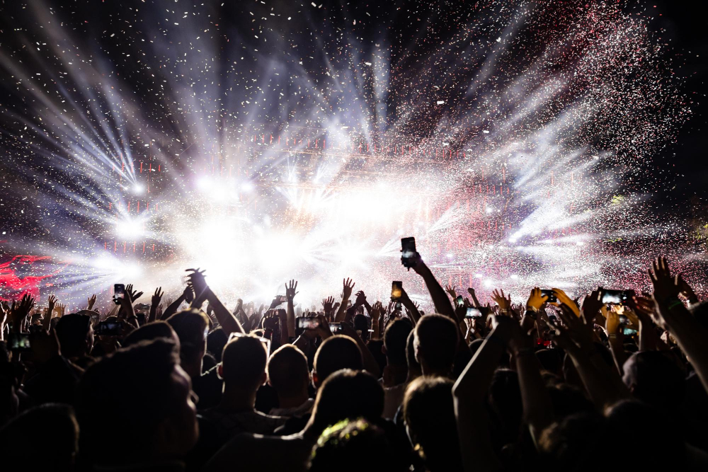 excited-audience-watching-confetti-fireworks-having-fun-music-festival-night-copy-space